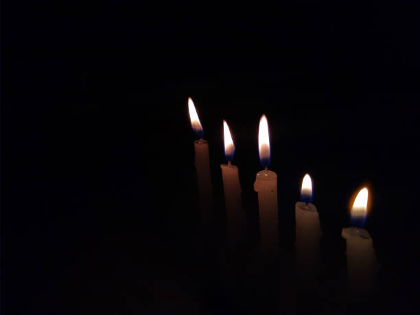 istock Candles burning in the dark 1271637196