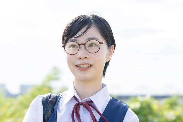 istock Asian high school girls wearing uniforms 1271637200