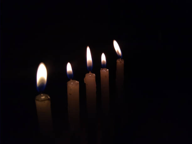 istock Candles burning in the dark 1271637202