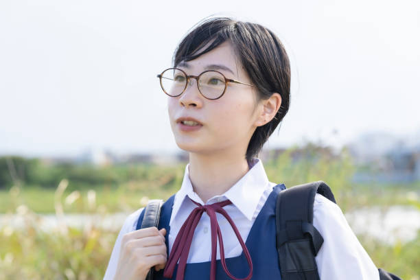 istock Asian high school girls wearing uniforms 1271637248