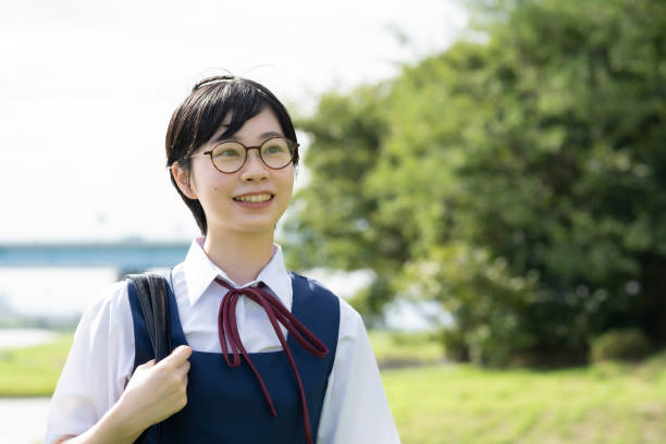istock Asian high school girls wearing uniforms 1271637934