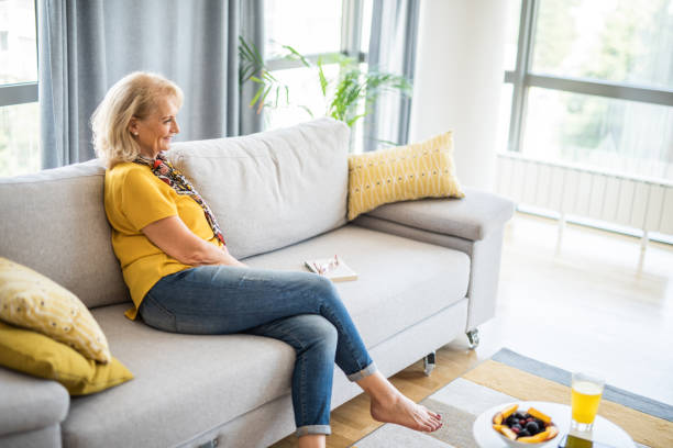 istock Mature woman relaxing at home. 1271639824