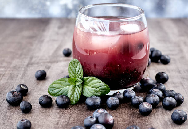 Fresh made Blueberry Smoothie on wooden background