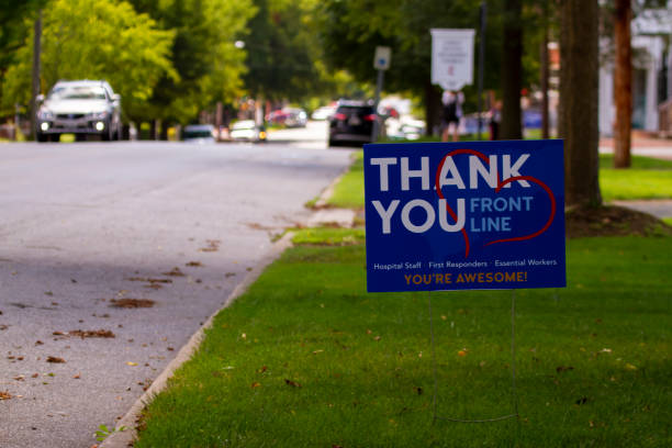 A thank you sigh for all frontline COVID fighters Chestertown, MD, USA 08/30/2020:  close up image of a yard sign by the street that says "Thank you' to all front line health care workers for their efforts during the COVID-19 pandemic. chestertown stock pictures, royalty-free photos & images