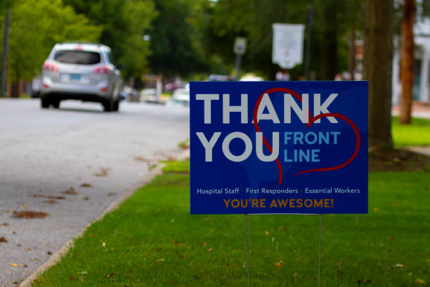 A thank you sigh for all frontline COVID fighters Chestertown, MD, USA 08/30/2020:  close up image of a yard sign by the street that says "Thank you' to all front line health care workers for their efforts during the COVID-19 pandemic. chestertown stock pictures, royalty-free photos & images