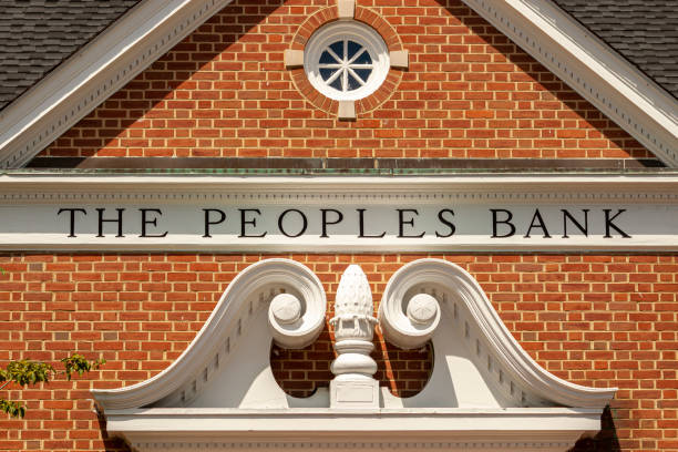 the main office of The Peoples Bank. Chestertown, MD, USA 08/30/2020: Close up image of the main office of The Peoples Bank. Founded in 1910 in Chestertown, it is an independent community bank that has served eastern shore of Maryland. chestertown stock pictures, royalty-free photos & images