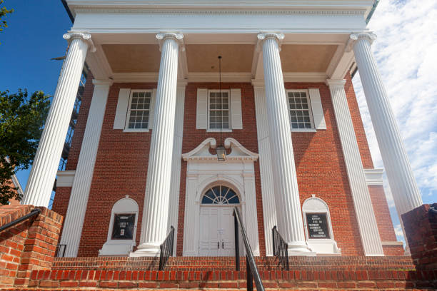 First United methodist Church in Chestertown, MD Chestertown, MD, USA 08/30/2020: Close up view of the First United Methodist church located in the city center of Chestertown. This is a historic brick building with tall columns in front of it. chestertown stock pictures, royalty-free photos & images