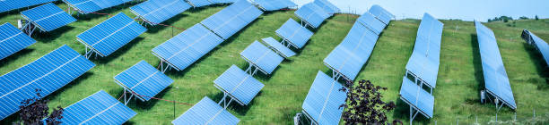 istock Blue solar panel background of photovoltaic modules for renewable energy. Copy space. Banner. Solar panels against blue sunny sky produce green, environmentally friendly energy from sun. 1271660990