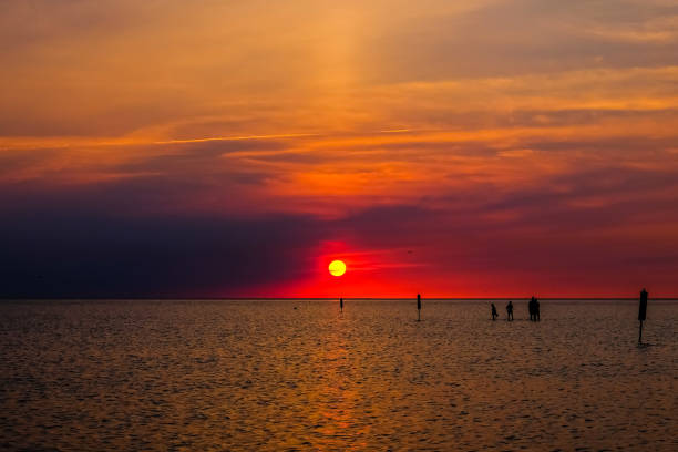 istock red sunrise or sunset over the sea 1271662156