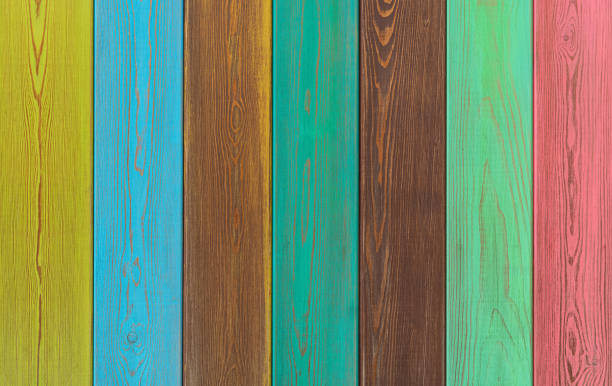 istock Multicolored modern wooden background. The boards are arranged vertically 1271663563