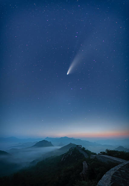 Comet C/2020 F3 Neowise in night starry sky,The great wall of china Comet Neowise A very rare astronomical event - a spectacular sight streaking across the skies over the China and around the world. Comet Neowise - officially called C/2020 F3 "u2013 first appeared towards the end of March. comet photos stock pictures, royalty-free photos & images