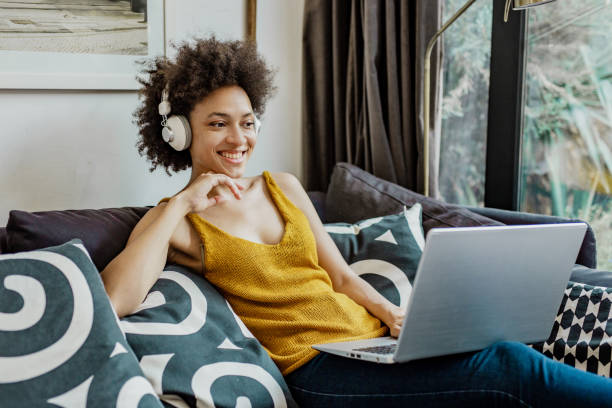 istock A mixed race woman is working from home on a laptop 1271670607