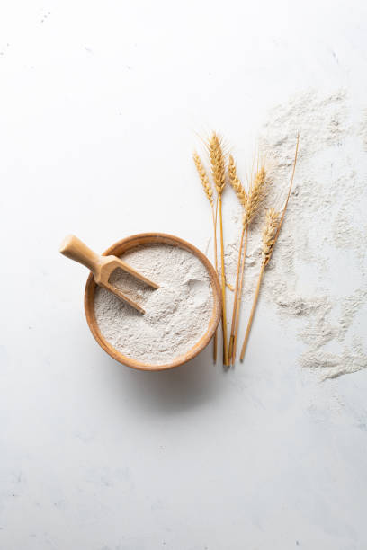 overhead view of whole grain flour - whole wheat flour imagens e fotografias de stock