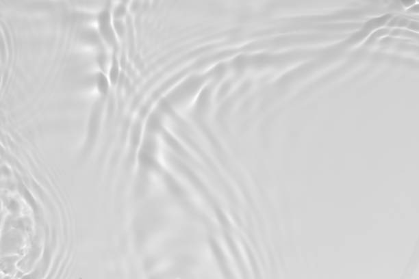 istock desaturated transparent clear calm water surface texture 1271670698