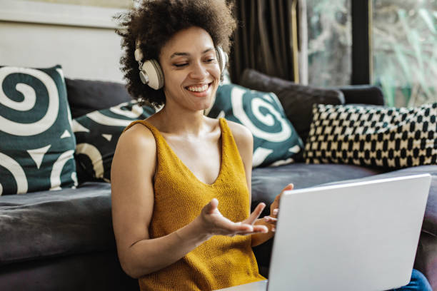 istock A woman discusses work with colleagues via video call 1271670836