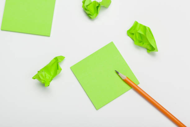 istock crumpled paper on white table brainstorming in the office concept 1271672142