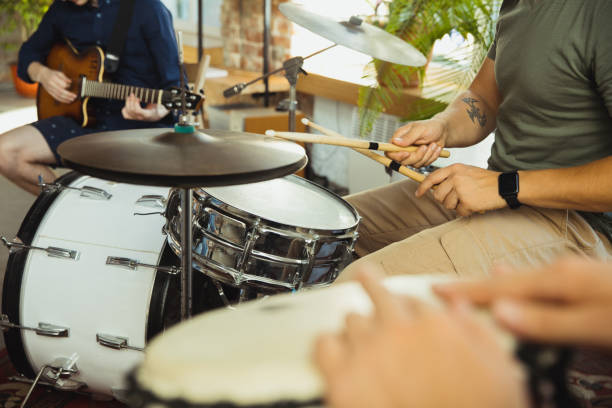 istock Musician band jamming together in art workplace with instruments 1271673227
