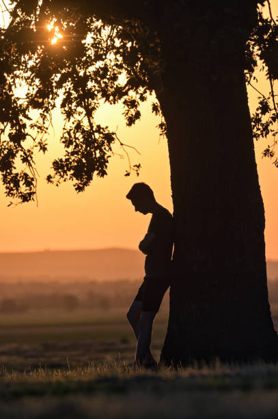 istock Closeup portrait young man alone at sunset 1271673932