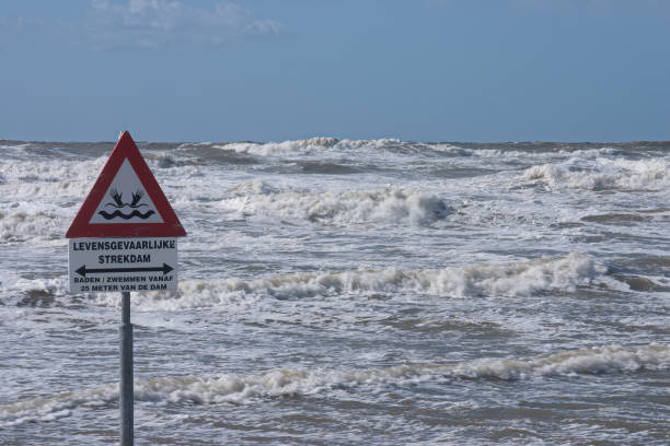 istock Sign warning for dangerous currents cause by a dam 1271678335