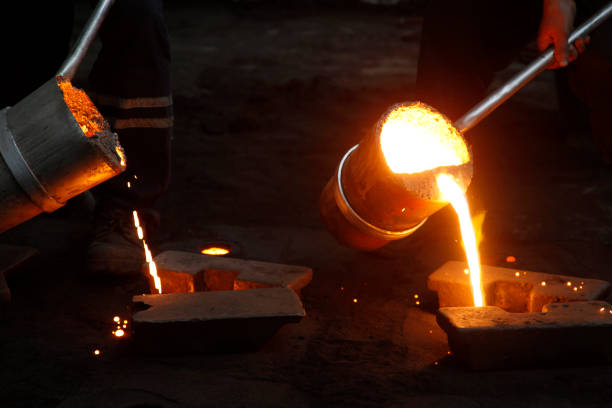 Liquid Molten Steel Industry.  Casting, melting, molding and foundry. Liquid Molten Steel Industry.  Casting, melting, molding and foundry. metal molding stock pictures, royalty-free photos & images