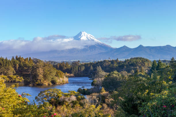 istock Lake Mangamahoe and Taranaki volcano landscape 1271679176