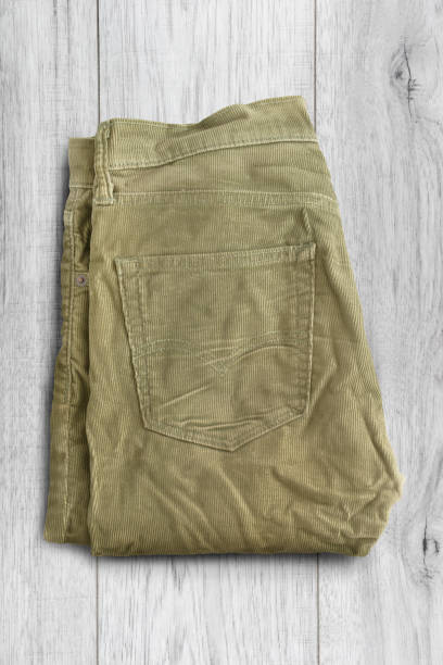 istock Pants on wooden background 1271680688