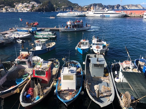 Colorful scenics and boats at the harbor of Ponza Island, Lazio, Italy, a popular holiday location for Italians.