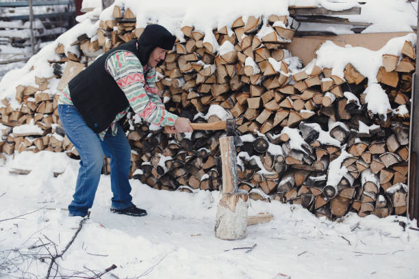 Ax in a deck in the snow in winter.