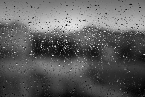 istock Water drops on window after heavy rain as texture or background 1271686031
