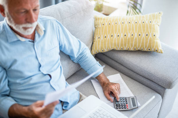 istock Senior man taking care of bills. 1271689147