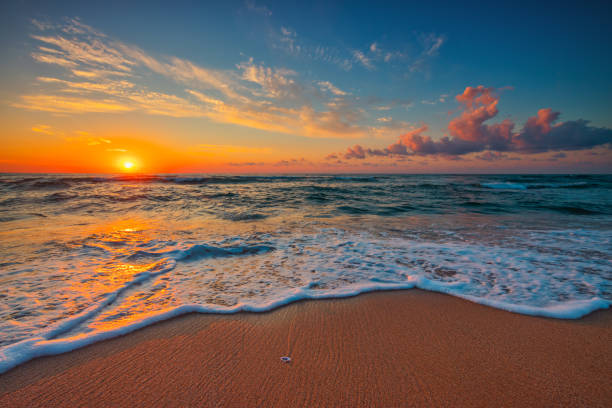 istock Beautiful cloudscape over the sea, sunrise shot 1271690593