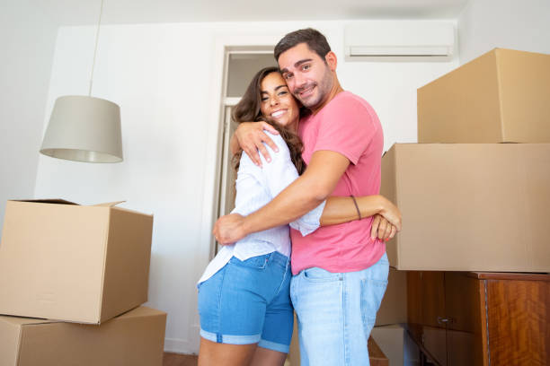 istock Happy couple moving into new apartment 1271695796