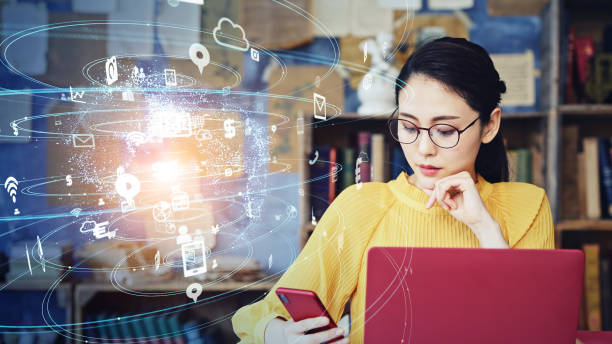 istock Communication network concept. Young asian woman in the office. 1271697790