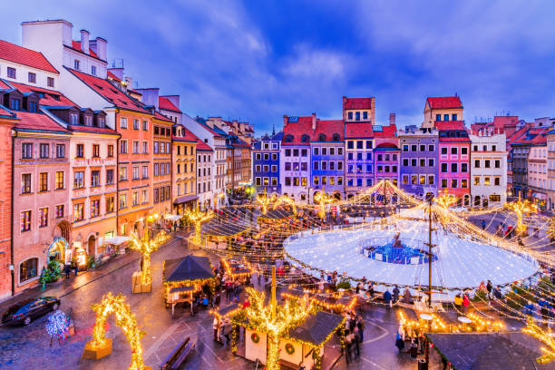 Warsaw, Poland - Christmas Market Warsaw, Poland - Skating rink in the Old Town Square and Christmas Market warsaw stock pictures, royalty-free photos & images