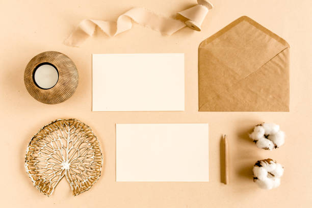 istock Mockup wedding invitation, blank greeting card and craft envelope. Flat lay, top view 1271700369