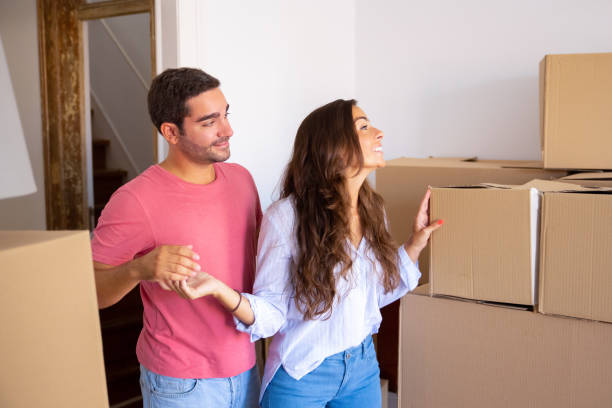 istock Happy handsome young man showing new apartment 1271702479
