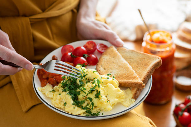 istock Scrambled eggs with baked beans and bread toast 1271702482