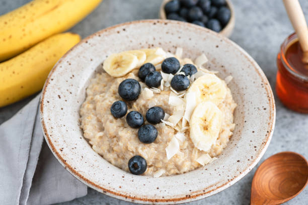 istock Oatmeal with blueberries, banana 1271702504