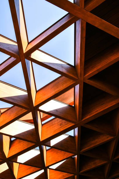 istock Roofing Construction. Wooden Roof Frame House Construction. Abstract Structure background. Wood texture pattern. 1271703475