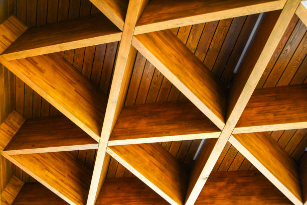 istock Roofing Construction. Wooden Roof Frame House Construction. Abstract Structure background. Wood texture pattern. 1271703494