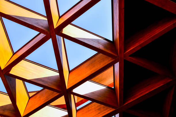 istock Roofing Construction. Wooden Roof Frame House Construction. Abstract Structure background. Wood texture pattern. 1271703526