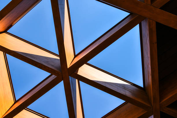 istock Roofing Construction. Wooden Roof Frame House Construction. Abstract Structure background. Wood texture pattern. 1271703563