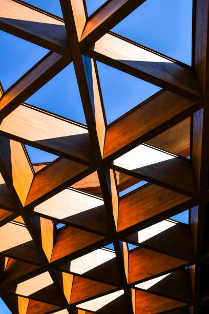 istock Roofing Construction. Wooden Roof Frame House Construction. Abstract Structure background. Wood texture pattern. 1271703569