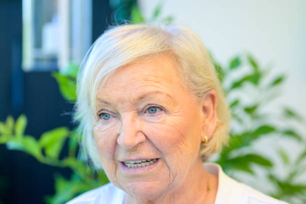 istock Attractive senior lady in her eighties chatting 1271704445