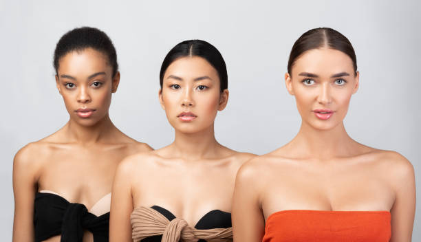 istock Three Multicultural Model Girls Posing Wearing Underwear Over Gray Background 1271707242