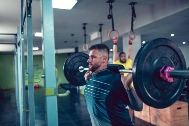 istock Overhead Barbell Press By Male Gym Junkie 1271707263