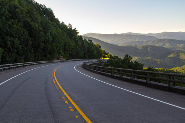 Great Smoky Mountains National Park Foothills Parkway Winding Appalachian Mountain road along the Foothills Parkway. The completed section is 16 miles and runs between Wears Valley and Walland Tennessee and was completed in 2018. foothills parkway photos stock pictures, royalty-free photos & images