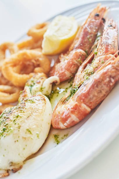 istock Combo of cuttlefish, calamari ring and prawns 1271708133