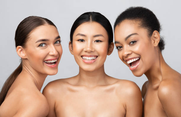 istock Three Joyful Models Girls Posing Smiling To Camera, Studio Shot 1271708840