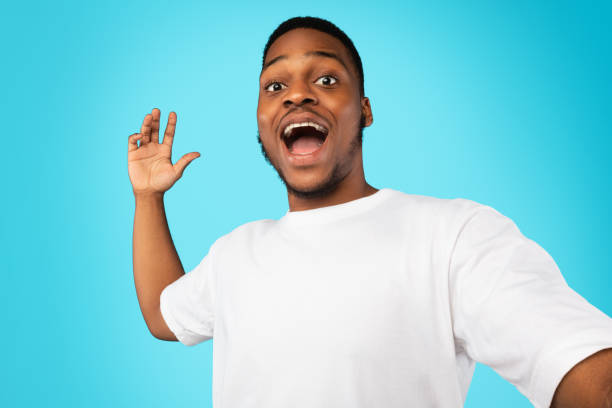 istock Funny African Man Making Selfie Over Blue Background, Studio Shot 1271709037